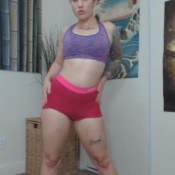 booty shaking pink spandex shorts goddess green eyed